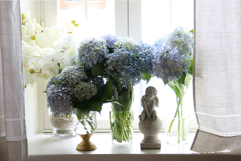Hortensias y cortinas de lino en Casa Leopoldo
